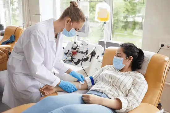 Doctors with patient